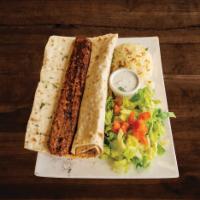 Adana Kebab Plate · Served with lavash bread. Charcoal grilled minced lamb with parsley, red onions and spices. ...