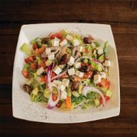 Greek Salad · Lettuce, tomatoes, cucumbers, onions, olives, topped with feta cheese and dressing. Served w...