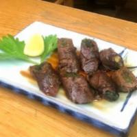 9. Negimaki · Thin sliced beef rolled with scallions. 