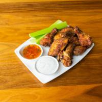 Wings · A pound and a 1/2 of fresh chicken wings tossed in either our Harry's house teriyaki, BBQ, H...