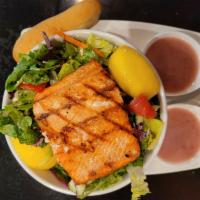 Mediterranean Salmon Salad · Grilled or blackened wild caught Alaskan Sockeye Salmon on mixed greens with house Bruschett...