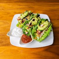 Lettuce Tacos · 3 romaine leaves filled with fresh avocado, shredded jack and cheddar cheese, pico de gallo,...
