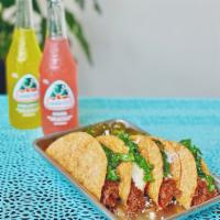 4 Hard Shell Beef Tacos · Order contains four (4) hard shell tacos filled with shredded barbacoa beef, crema, shredded...