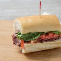 Roast Beef Sandwich · Includes mayonnaise, spicy mustard, tomato, lettuce, red onion and cheddar cheese on french ...