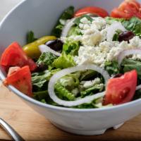 Greek Salad · Romaine, feta, pepperoncini, Kalamata olives, red onion, tomato and Greek dressing.