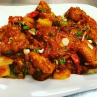 Gobi Manchurian (Vegan) · Favorite. Fresh florets of cauliflower battered, fried and cooked with bell pepper, onion an...
