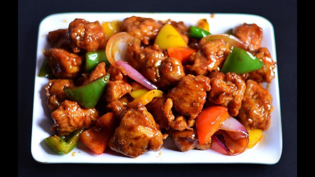 Chili Chicken  · Deep-fried chicken pieces tossed in a chef special sweet-sour chili sauce with onions, bell pepper, cilantro, and soya sauce. Spicy.