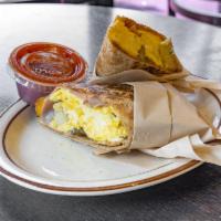 Southern Breakfast Burrito · 3 eggs, ham, cheddar cheese and potato.