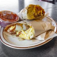 Country Breakfast Burrito · 3 eggs, bacon, cheddar cheese and potato.