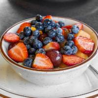 Fruit Bowl Breakfast · Strawberries, honeydew, cantaloupe, and grapes.