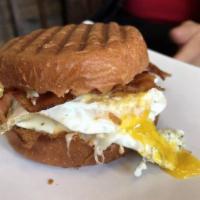 Egg Sandwich · Over easy organic egg, with special sauce served on a brioche bun. 
