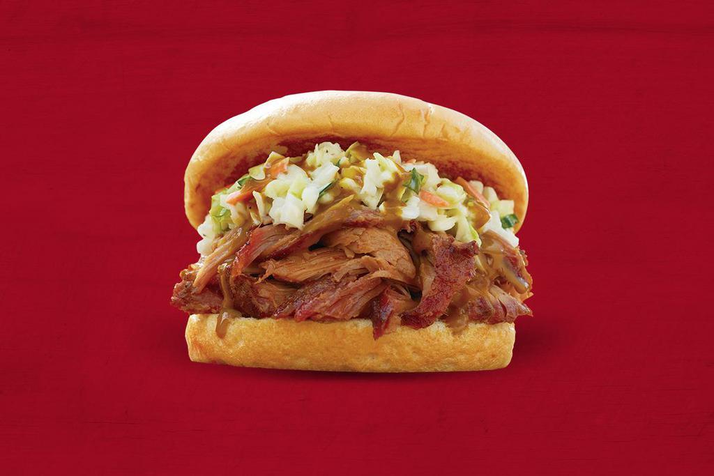 Sweet Carolina BBQ Sandwich · Pulled pork topped with homemade coleslaw and Sonny’s signature Carolina sauce on a bun.