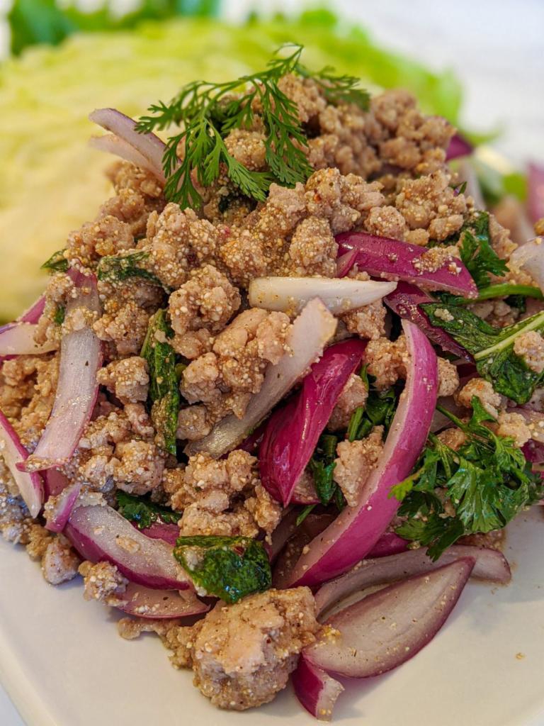 Larb · Minced chicken, pork, beef, tofu or mock duck, shrimp for an additional charge sauteed and tossed in lime dressing with toasted rice powder, onions, cilantro
and fresh mint.