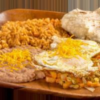 Huevos Rancheros Plate · 2 over easy eggs on a bed of pico de gallo.