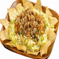 Fili's Chicken Salad · Corn tortilla chips, grilled chicken, pico de gallo, and lettuce.