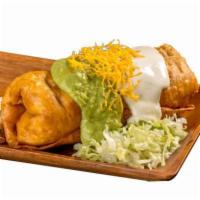Chimichanga · Shredded beef or chicken burrito, deep-fried, and topped with guacamole, sour cream, cheese,...