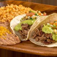 18. Carne Asada Tacos · 2 carne asada tacos.