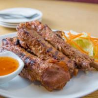 71. Thai BBQ Ribs · Tender pork ribs grilled with homemade BBQ sauce.