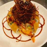 Medusa Sumo Special · Spicy crab, avocado, cucumber, and shrimp tempura topped with inari, and deep-fried crab sti...