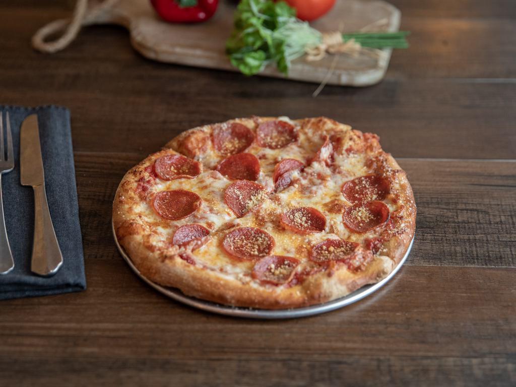 Pepperoni Pizza · Mellow red sauce, mozzarella, and pepperoni on Mellow's crust, buttered and sprinkled with Parmesan.