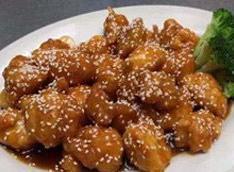 C3. Sesame Chicken · Lightly batted chicken deep-fried and coated with special sesame sauce and sesame seeds on t...