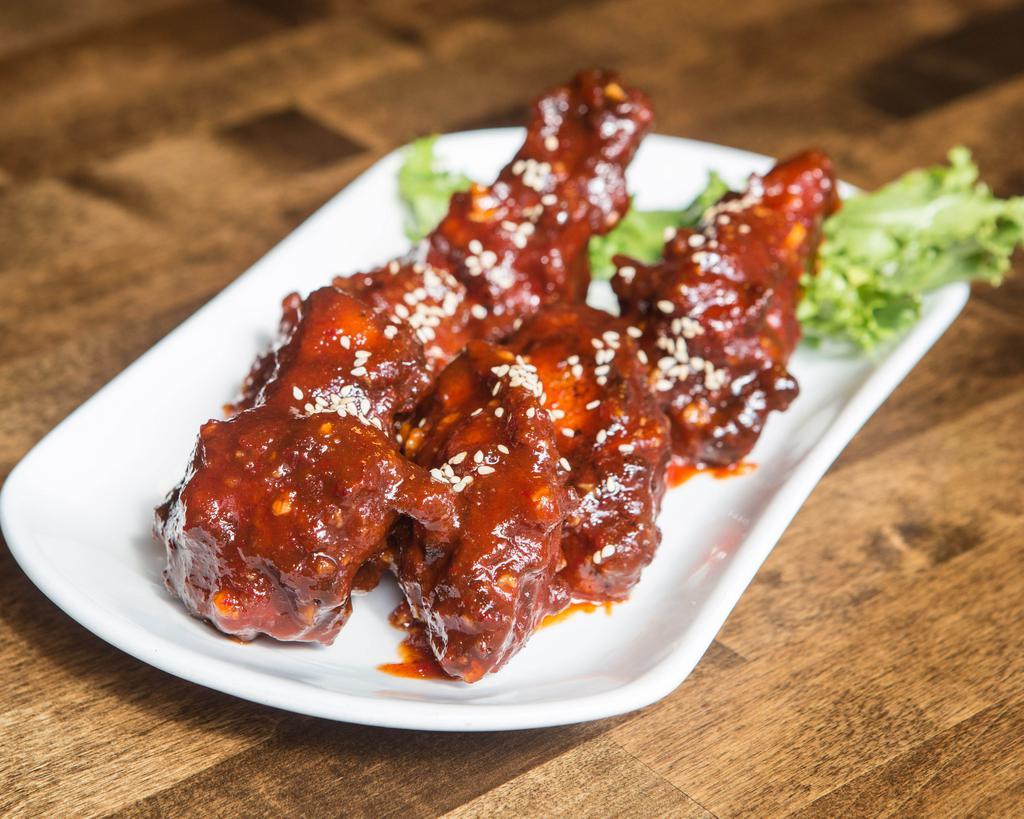 Yang Yum Chicken · Popular Korean spicy flavor from go chu jang and garlic based sauce. Korean style fried chicken wings.