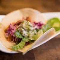 Bul Dak Taco · Spicy chicken, guacamole and house made kiwi dressing. Single serve. Spicy.