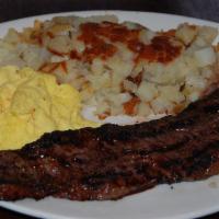 Skirt Steak and Eggs · Marinated skirt steak served with 2 eggs any style and steaming potatoes. 