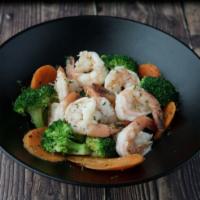Camarones Con Vegetales · Shrimp and steamed vegetable with tasty garlic butter.