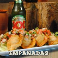 Empanadas · Four assorted empanadas, chicken and cheese or beef and cheese. Served with pico de gallo an...