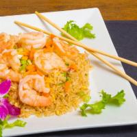 29. Shrimp Fried Rice · Jasmine rice stir fried with egg, peas, carrots onions and your choice of meat.