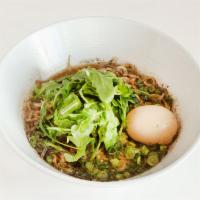 Tan Tan Ramen · 8-hour pork belly, 12- hour tonkotsu broth, tamago scallions, cabbage baby arugula, sesame s...