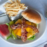 Lulu's Cheeseburger · 1/2 lb. burger, cheddar cheese, lettuce, tomatoes and special sauce on choice of bun. Served...