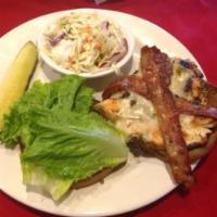 Spicy Chicken Sandwich · Seasoned battered chicken breast with Louisiana hot sauce, lettuce, tomato, chipotle aioli, ...