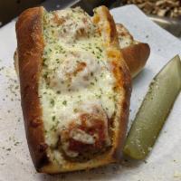 Meatball Parmigiana Boat · Mama's homemade meatballs simmered in marinara sauce topped with Parmigiana cheese and mozza...