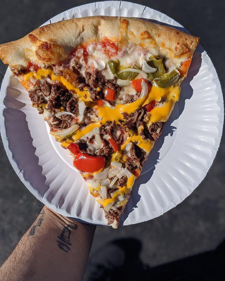 Philly Cheesesteak Pizza · Chopped steak, fried onions, peppers, mozzarella cheese and cheese whiz.