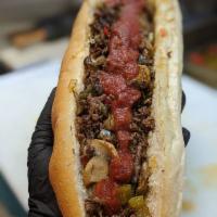 The Bird Philly Cheesesteak · Chopped steak, fried onions, pepper, mushrooms, marinara sauce and cheese whiz.