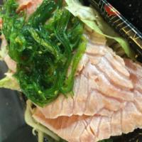Seared Salmon Salad · Sliced pan-seared salmon served with mixed green mango salad.