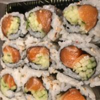 Salmon Cucumber Roll · Roll-cut into 6 pieces.
Hand roll one piece with cone shape.