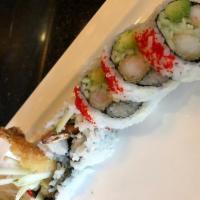 Shrimp Tempura Roll · Roll-cut into 5 pieces.
Hand roll one piece with cone shape.