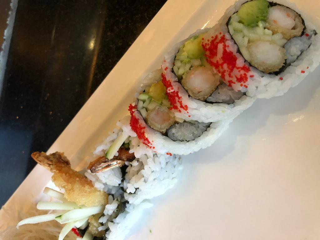 Shrimp Tempura Roll · Roll-cut into 5 pieces.
Hand roll one piece with cone shape.