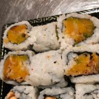Pumpkin Tempura Roll · Roll-cut into 6 pieces.
Hand roll one piece with cone shape.