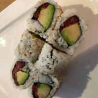 Sun-Dried Tomato Avocado Roll · Roll-cut into 6 pieces.
Hand roll one piece with cone shape.