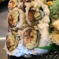 Eel Cucumber Roll · Roll-cut into 6 pieces.
Hand roll one piece with cone shape.