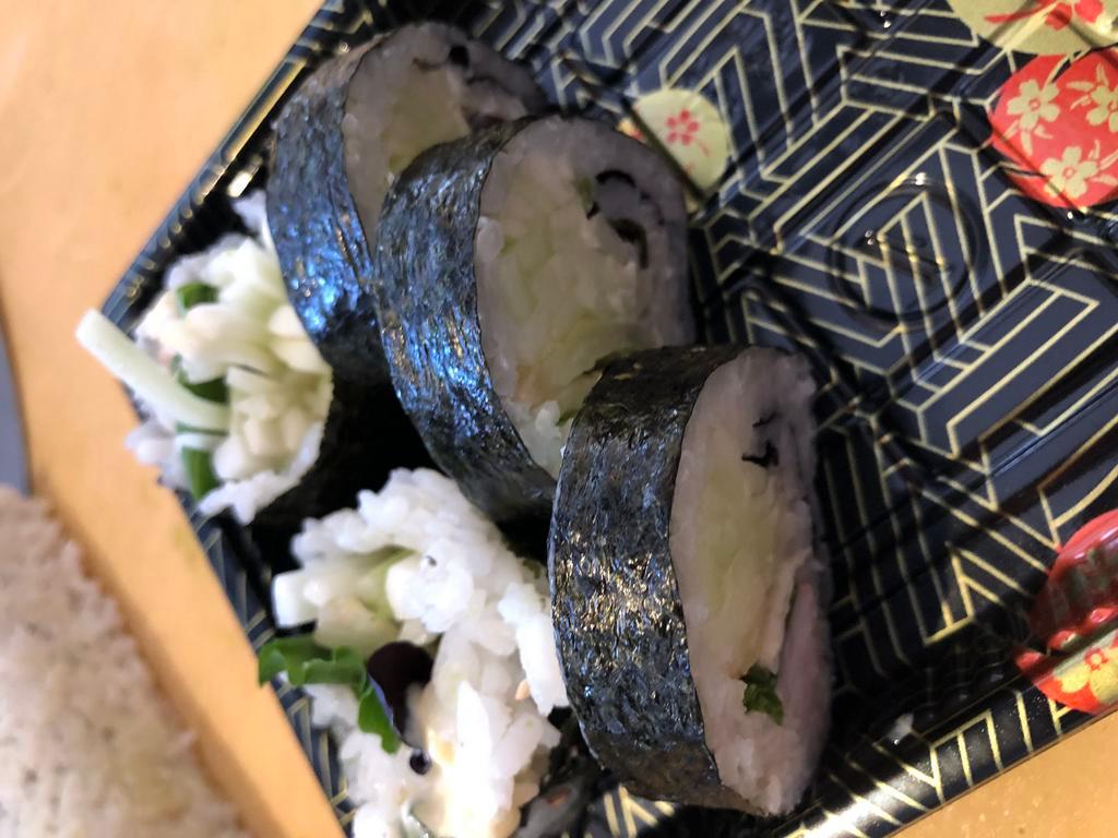 Boston Roll · Roll-cut into 5 pieces.
Hand roll one piece with cone shape.