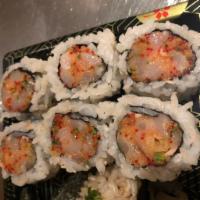 Spicy Scallop Roll · Mixed with crunch.Roll-cut into 6 pieces.
Hand roll one piece with cone shape.