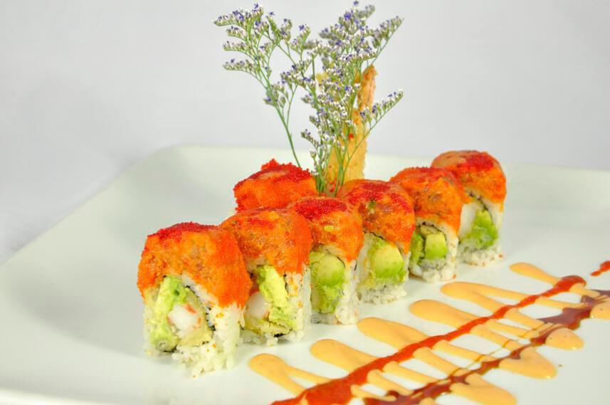 Manhattan Roll · Shrimp tempura and avocado topped with spicy tuna. Served with spicy mayonnaise and eel sauce.