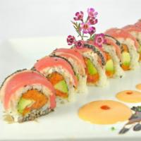 Sesame Crusted Tuna Roll · Spicy tuna and avocado topped with seared sesame tuna. Served with spicy mayo and eel sauce.