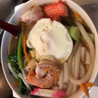Seafood Udon · Scallop, clam, squid, shrimp and egg udon noodle soup.