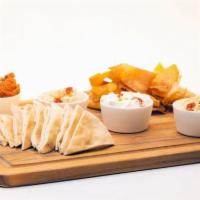 MEZE PLATE · Hummus / babaganoush / tzatziki / mouhamara / pita chips